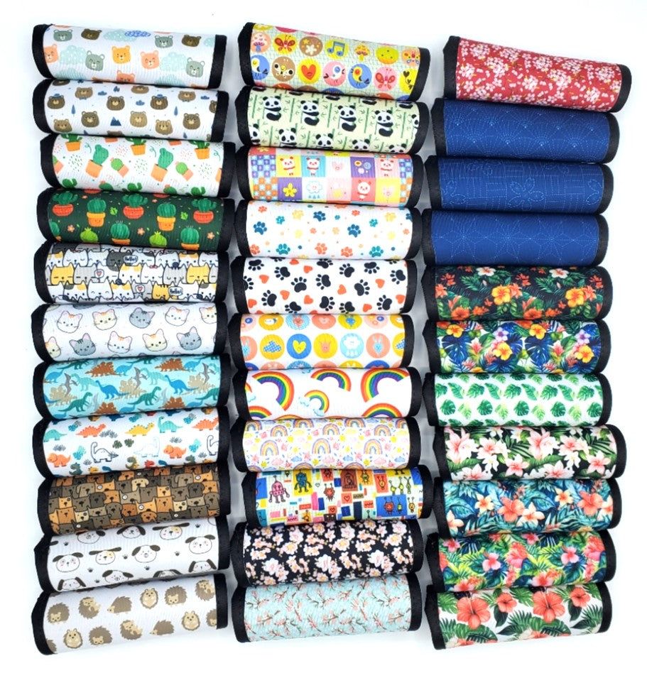 Assortment of neoprene luggage handle covers in horizontal style