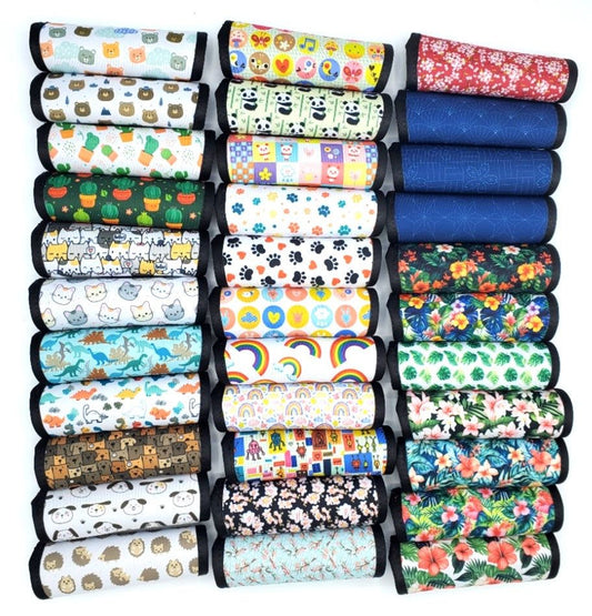 Assortment of neoprene luggage handle covers in horizontal style