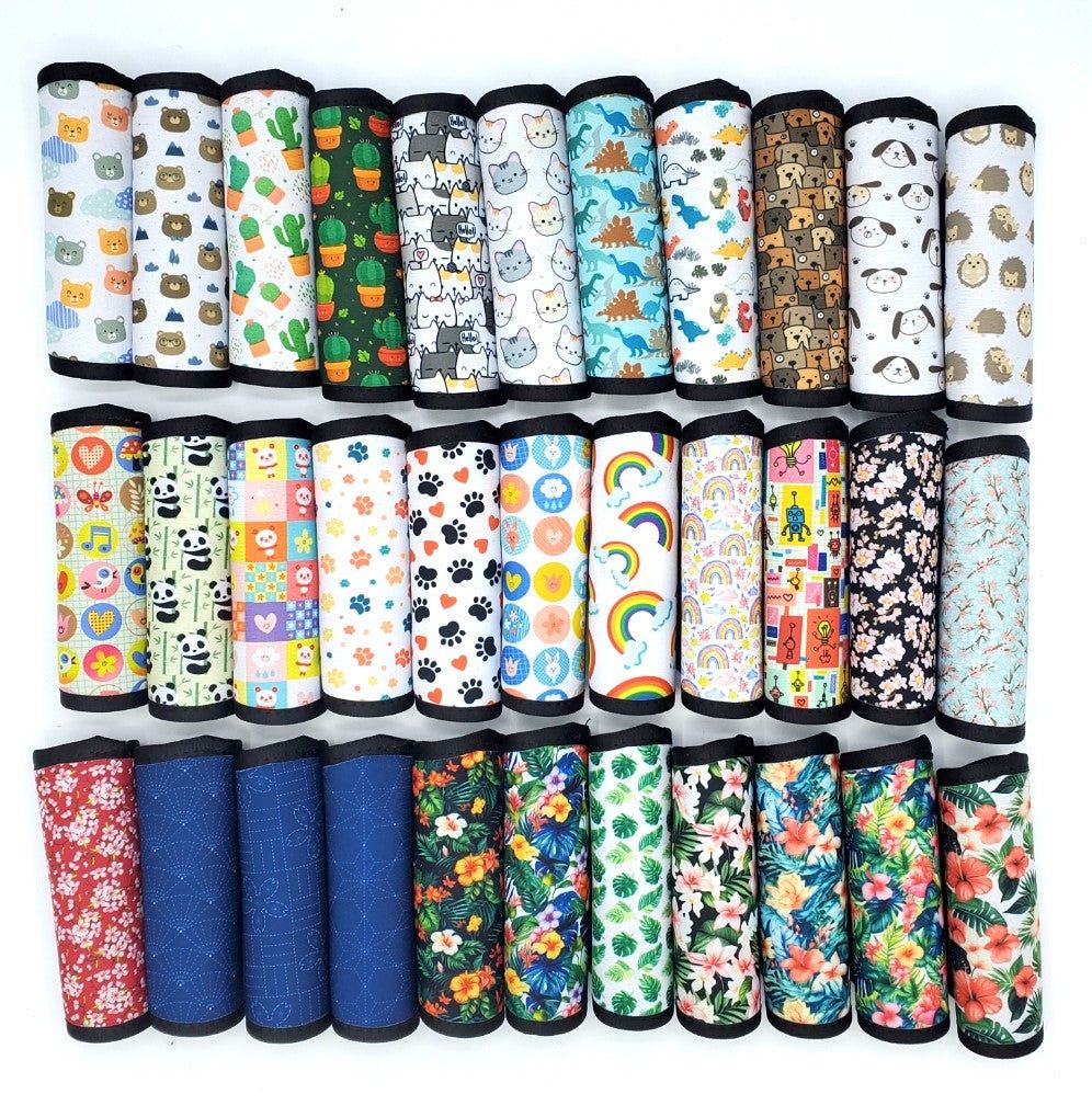 Assortment of neoprene luggage handle covers in vertical style