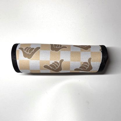 Hawaii artist neoprene luggage handle cover, horizontal, Shaka design in beige