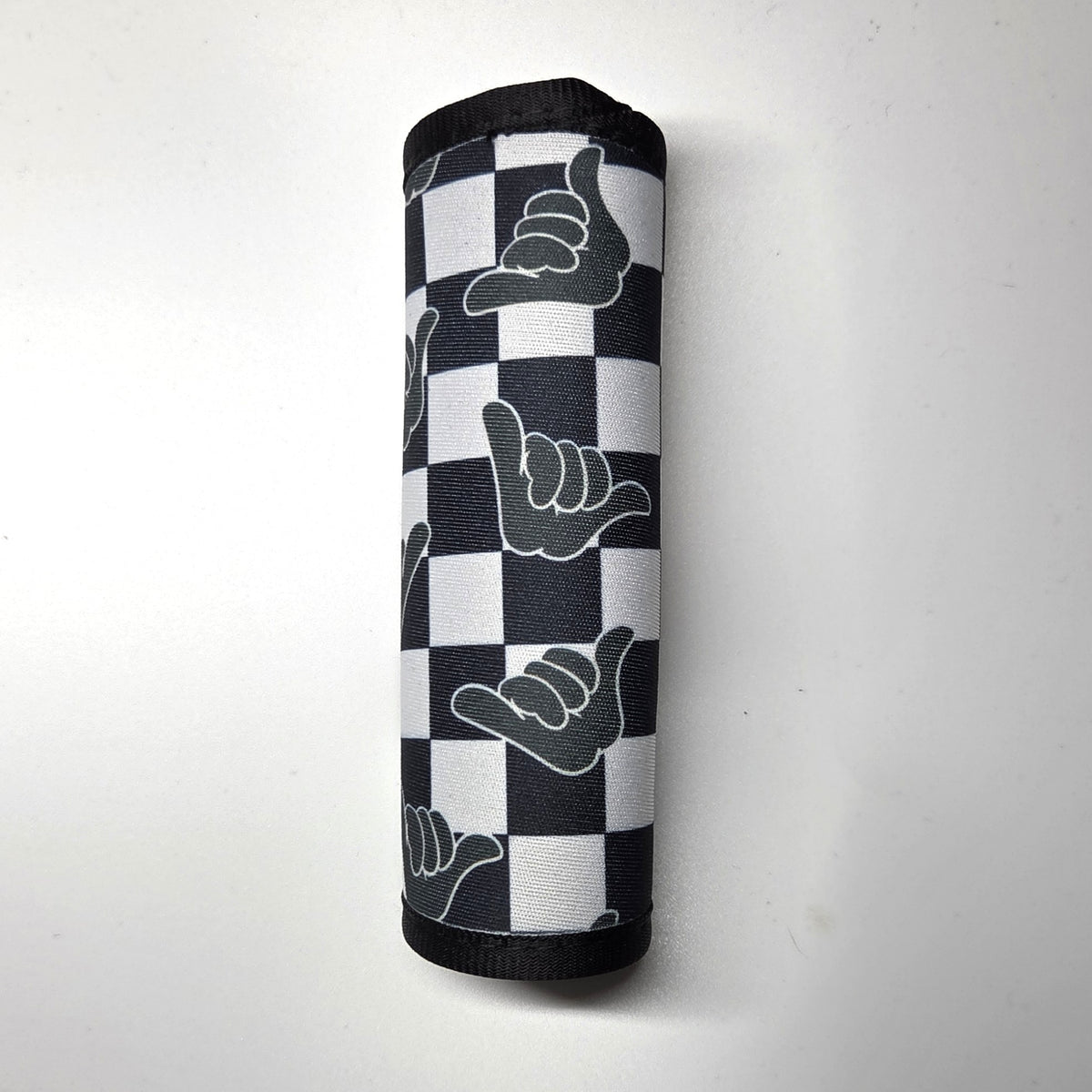 Hawaii artist neoprene luggage handle cover, vertical, Shaka design in black