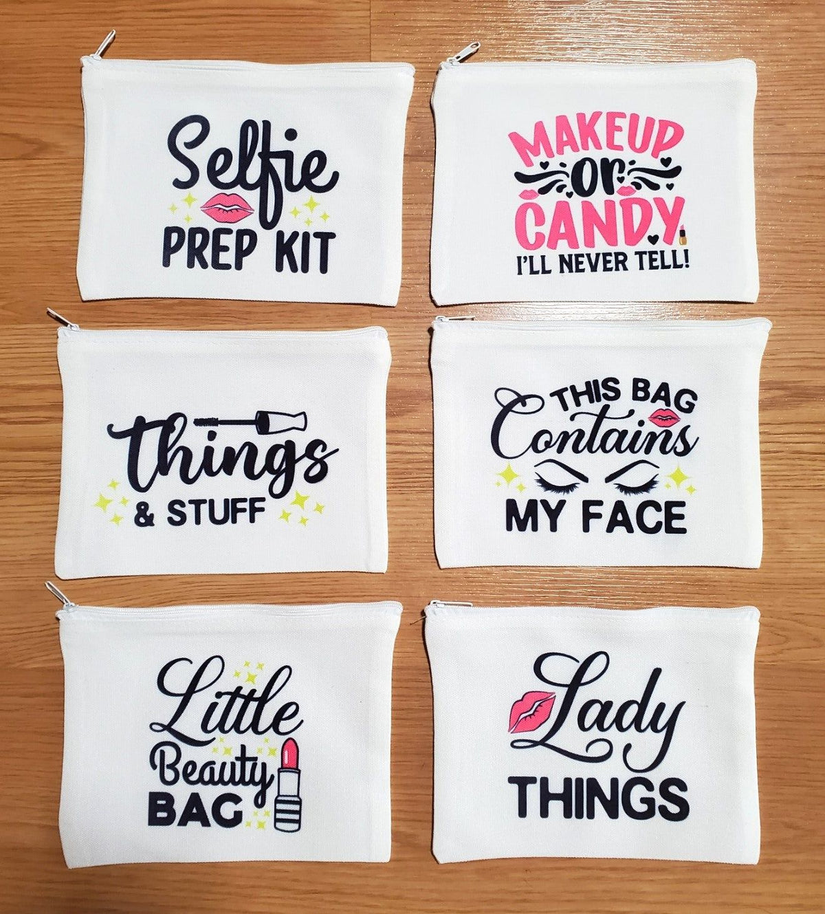 Assortment of zippered pouches in different designs